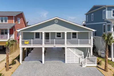 Image de Hobbs Realty - Riley's Relocation: Spacious 4-Bedroom Home Directly Across From Beach Access