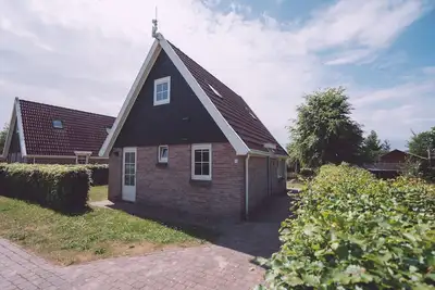 Image de Maisons et salle de groupe, à NatuurReservaat
