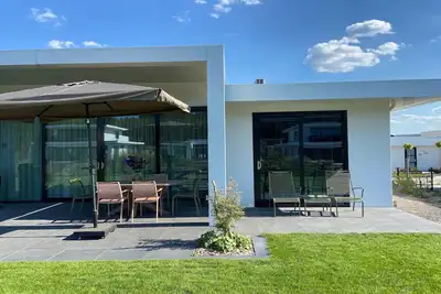 Image de villa à Harderwold avec jardin