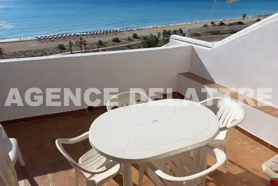 Image de Appartement studio Atico face mer, dans résidence avec commerces, piscines.  