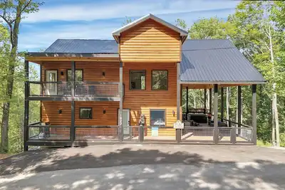 Image de New Built Cabin|Huge Game Room|Porch|Hot tub