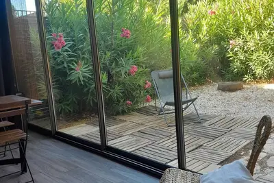 Image de Studio cabine avec jardin à 10 min à pieds des plages