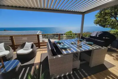 Image de Mobil-home luxe pleine vue mer 180°avec voiturette de golf privée