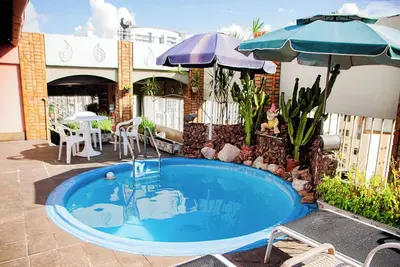 Image de Apto com Wi-Fi, churrasqueira e piscina privativa