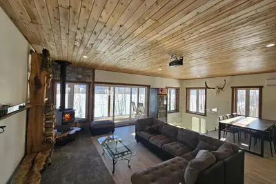Image de Chalet le Maikan - Refuge intime avec spa, plage privée et évasion en nature