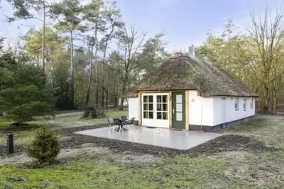 Image de Bungalow Ă Herperduin avec jardin