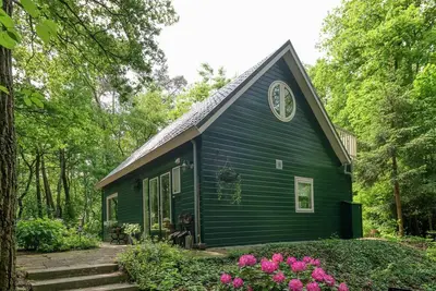 Maison de vacances dans une région boisée
