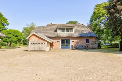 Image de Maison de vacances paisible Ă Wesepe avec jardin