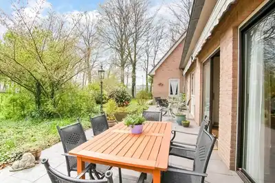 Image de Maison de vacances près d'Efteling avec jardin