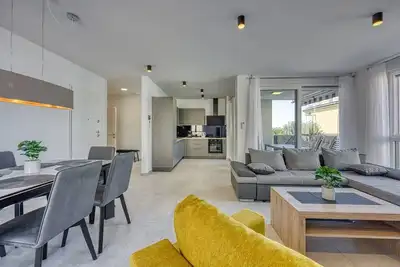 Image de A6 /Three-Bedroom Apartment