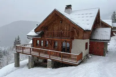 Image de Grand chalet 12 pers | À 20m des pistes | Sauna & vue montagne