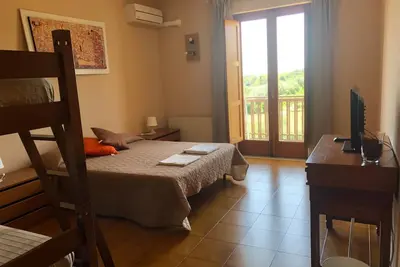 Image de Chambre d'hôtes 'Carolea - Frantoio' avec piscine partagée, Wi-Fi et climatisation