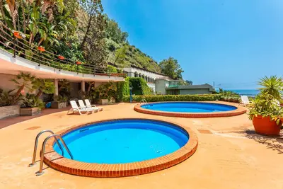 Image de Appartement 'Giulia's On The Sea' avec piscine partagée, Wi-Fi et climatisation