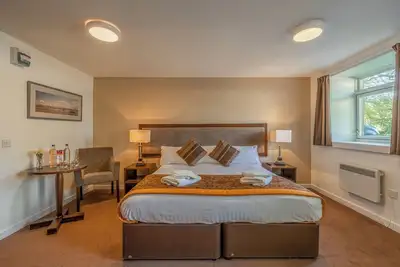 Image de Historic Stay w/ Cozy Ambiance | Surrounded by Scenic Trails, Breakfast Included