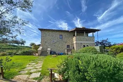 Image de GuestHost - Il Glicine, apt with garden and pool