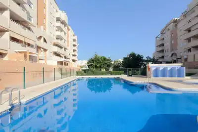 Image de Appartement 'Jardines De Playa Gandia' avec piscine partagée, Wi-Fi et climatisation