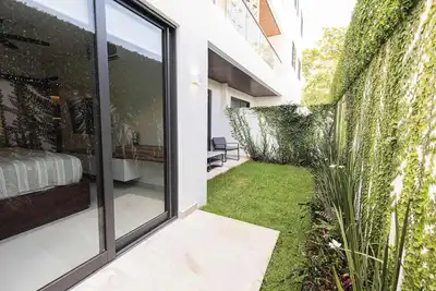 Image de Apt Manatí: Modern Getaway with Private Garden and Rooftop Pool with Ocean Views