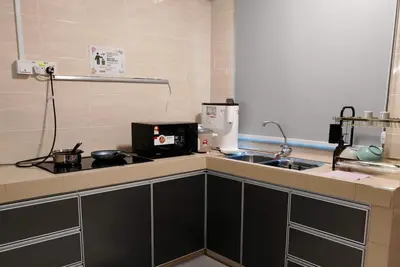 Image de Kuantan Rumah Kita at Tok Sira Near Beach Pool Netflix Karaoke Bbq 5br 5toilets