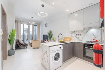 Image de Stylish 1-Bedroom Retreat in Amal Tower, Sports City