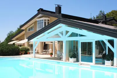 Image de Luxurious 6br Chalet with Pool, Sauna & Tennis Court in Saint-Paul-en-Chablais