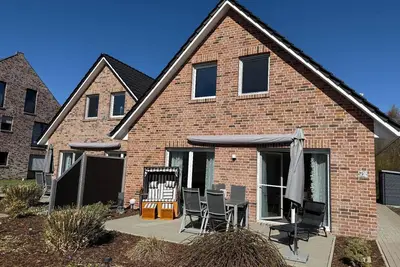 Image de Maison de vacances Butjadingen pour 1 - 4 personnes avec 2 chambres à coucher - Maison jumelée