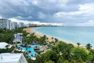 Image de New! ! Oceanview Luxury  Studio in the Heart of Isla Verde – Steps from the Beach!