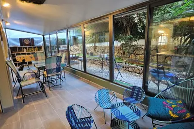 Image de Velo Appartement\nBABY Foot\n3 Vraies Chambres\n1 Minutes De La Mer\nJARDIN\nVERANDA