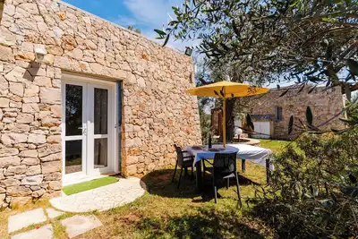 Image de Appartement 'Classic Dépendance - Angolo Cottura' avec piscine partagée, Wi-Fi et climatisation