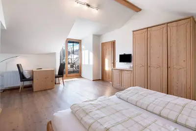 Image de Chambre 'Mairhof Acht Gipfel' avec vue sur les montagnes, terrasse privée et jardin partagé