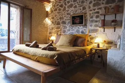 Image de Chambre double avec terrasse dans une maison de village à Corbara