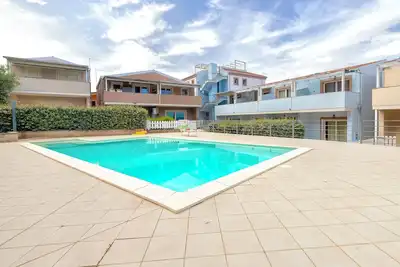 Image de Maison de vacances 'Romantica Casa Al Mare' avec piscine partagée, Wi-Fi et climatisation