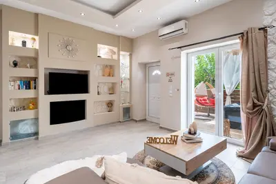 Image de Appartement \"Olive Grove Deluxe\" avec vue sur la montagne, Wi-Fi et climatisation