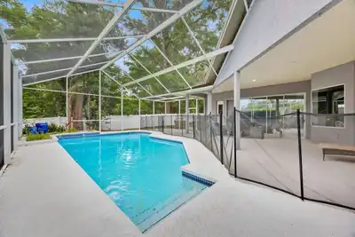 Image de Poolside Paradise | 30 Min From Disney | Pool | Patio