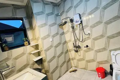 Image de Cozy Nest\nChic 1-bedroom apartment in superb Kigali with fitness room, WiFi.