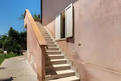 Image de Appartement 'Rosa Dei Venti' avec piscine partagée, Wi-Fi et climatisation