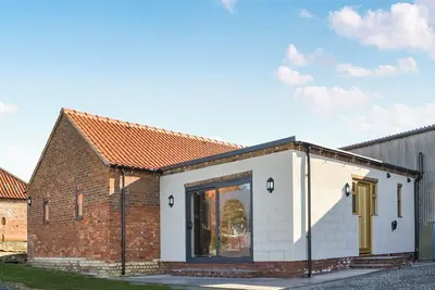 Image de Surrounded by open countryside on a working farm.