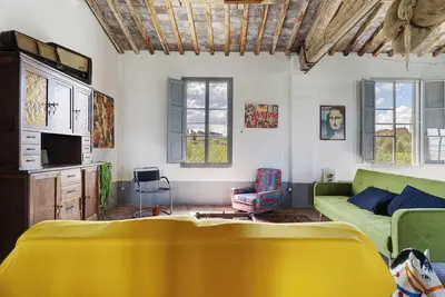 Appartement 'Le Caprine' avec jardin partagé, Wi-Fi et climatisation