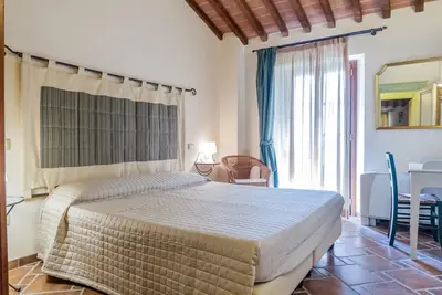 Image de Appartement 'Borgo La Contessa - Guido' avec piscine partagée, Wi-Fi et climatisation