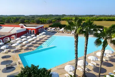 Image de Maison de vacances 'Mery Villaggio Chiusurelle' avec terrasse privée, jardin privé et climatisation