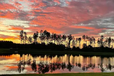 Image de Charming brand new 4-bedroom house with a pond view. Close to Tampa and Orlando.