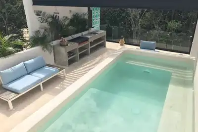 Image de Great location/Ks beds/rooftop/pool&Bbq/dumbbells