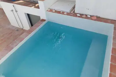 Image de Cosy Terrace House - design, comfort, micro-pool, top location in Olhão