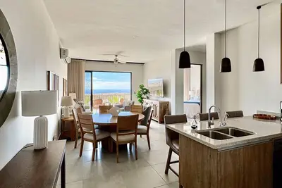 Luxurious coastal ocean view condo with shared pool and private balcony