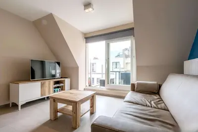 Image de Appartement avec vue latérale sur la mer