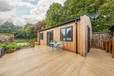Image de Relax into this stunning, specially adapted lodge set within the old stables on the owner’s farm in