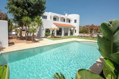 Ibiza style villa with large pool in popular south near town and beaches!