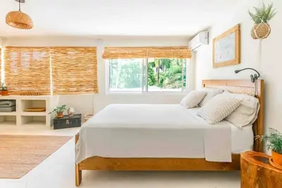 Image de Explorer · Explorer Triple room with garden and lagoon view