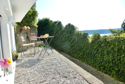 Image de Appartement \"Bodenseeglück\" avec vue sur le lac, terrasse privée et Wi-Fi
