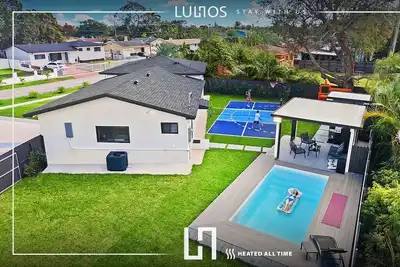 Image de Modern 5br Dream – Pool, Games, Sleeps 12