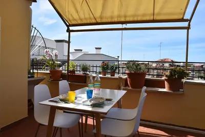 Penthouse overlooking the rooftops of Anzio's historic buildings, downtown but within walking distance of the beach.